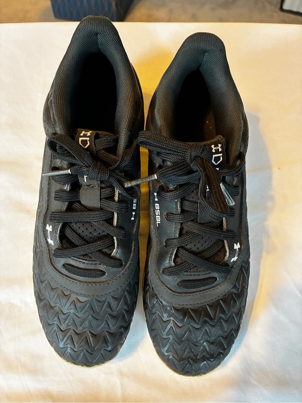 Under Armour youth size 5 baseball cleats .